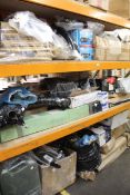 A large quantity of assorted car parts and related items.