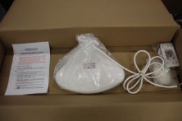 A boxed as new Tornado Body Dryer.