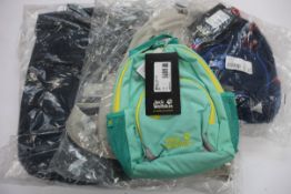 A Jack Wolfskin Piccadilly Night blue backpack, a women's Jack Wolfskin Ancona Dusty backpack, a