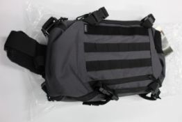 Three 5.11 Rapid sling back backpacks in coal.