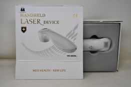 A RK-6000HL handheld cold laser therapy device (Box Damaged).