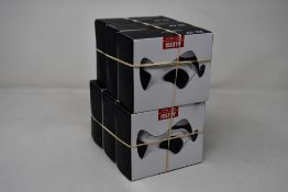 Six boxed as new Alessi BLIP stainless steel spoon rests.
