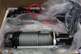 An as new unbranded Vehicle Recovery Electric Off-Road Winch (Box damaged).
