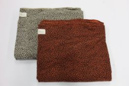 A quantity of as new Bon Bear Leopard baby wraps.