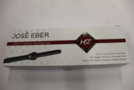 A boxed as new Jose' Eber HST 25mm Clipless Curling Iron.