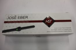 A boxed as new Jose' Eber HST 25mm Clipless Curling Iron (Some minor damage to packaging).
