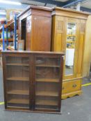 An Edwardian Oak Wardrobe with a mirror door and one drawer (H)203 x (W)87 x (D)41cm, an Edwardian