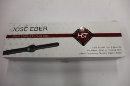 A boxed as new Jose' Eber HST 25mm Clipless Curling Iron (Some minor damage to packaging).