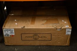 A boxed as new Power Plate Move Vibration Plate in Red.