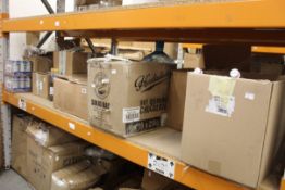 A quantity of assorted foods and drinks.