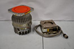 A pre-owned Varian TV-301 Navigator turbomolecular Pump (Model: 9698918M002).