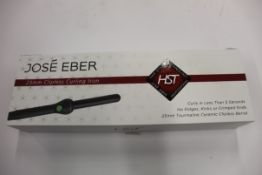 A boxed as new Jose' Eber HST 25mm Clipless Curling Iron.