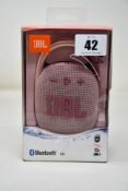 An as new JBL Clip4 clip-on bluetooth 5.1 portable speaker in Pink.