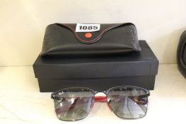 A pair of as new Ray-Ban X Ferrari Sunglasses 0RB3673M F04111 (Box has some damage).