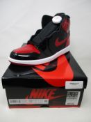 A pair of men's Jordan Retro 1 High OG in black/varsity-red/white (UK 9).