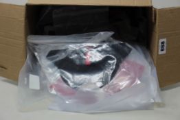 Twenty five pairs of as new Assos Cycling Socks and four as new Assos Cycling caps.