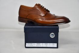 A pair of men's boxed as new Paolo Vandini Gerard Leather Brogues in tan (EU44).