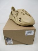 A pair of boxed as new Adidas Yeezy Foam Runner in Ochre (UK 8).