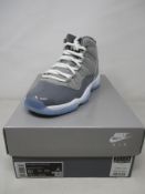 A pair of boxed as new Nike Air Jordan 11 Retro (GS) in cool grey (5.5Y, UK 5).