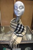 An as new Burberry sequined check cashmere scarf (Article 8050535 - RRP £484).