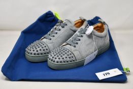 A pair of pre-owned Christian LouBouton Louis Flat Spikes in pale green (EU 41).