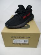 A pair of boxed as new Adidas Yeezy Boost 350 V2 in black/red (UK 9).