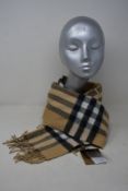 An as new Burberry sequined check cashmere scarf (Article 8050535 - RRP £484).