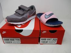 A pair of Nike MD Valiant JNR purple suede trainers (Size UK 2) and a pair of Nike Kawa SE JNR