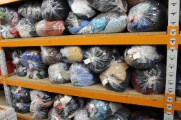 Thirty four bags of assorted pre-owned clothing and related.