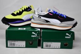 A pair of Adult Puma Rider Stream On trainers (UK 4) and a pair of Adult Puma Rider Play On trainers