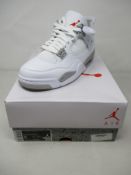 A pair of boxed as new Air Jordan 4 Retro in black/white/fire red/grey (UK 8).