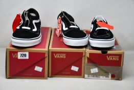 A pair of Vans SK8-Low black/true white sneakers (Size UK 6) and two pairs of Vans Old School