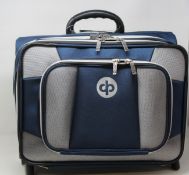 A boxed as new Drakes Pride low roller trolley in Navy (REF: B4292).