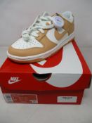 A pair of women's boxed as new Nike Dunk Low W Harvest Moon with authentication tag (UK 5.5).