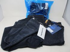 Three pairs of as new Acne Studios jeans (W25/L30, W26/L34, W30/L30).