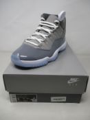 A pair of boxed as new Nike Air Jordan 11 Retro Cool Grey (UK 8).