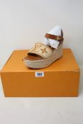 A pair of women's Louis Vuitton platform sandals and dust covers (Size 39 UK 6) (Outer box