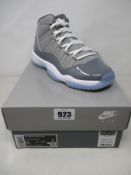 A pair of boxed as new Nike Air Jordan 11 Retro (GS) in cool grey (6Y, UK 5.5).