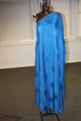 A Stella McCartney off the shoulder sari style dress in electric blue and patterned print,