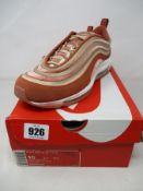 A pair of women's Nike Air Max UL 17 LX Dusty Peach trainers (Size UK 7.5).