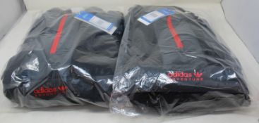 Two as new Adidas Adventure SQM-93 track tops in black (L).