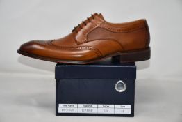 A pair of men's boxed as new Paolo Vandini Gerard Leather Brogues in tan (EU44).