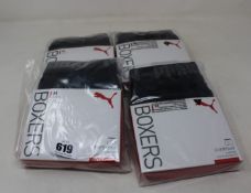 Twenty seven packs of two Puma Everyday Boxers in black (M).
