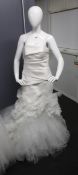 An as new Vera Wang Bride Eliette strapless fit and flare wedding dress with open back (UK 12).
