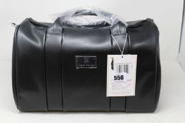 An as new Nova Harley Manhattan blackberry leather changing bag.