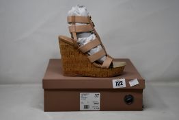 A pair of as new Carvela Kunnning Wedge in Tan (Size 37).