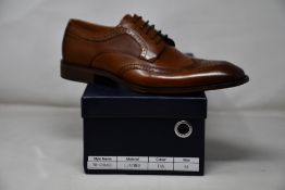 A pair of men's boxed as new Paolo Vandini Gerard Leather Brogues in tan (EU44).