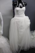 An as new Vera Wang Bride Alizee Princess wedding dress with open back (UK 14 - RRP £2800).