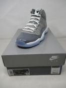 A pair of boxed as new Nike Air Jordan 11 Retro (GS) in cool grey (6Y, UK 5.5).