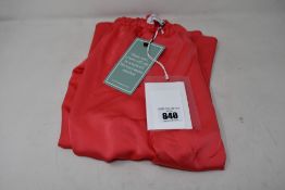 A pair of 16Arlington Mandrake fluid satin elasticated waist wide leg relaxed trousers in pink (UK